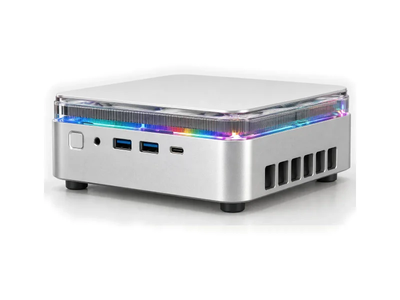 Silver mini PC with transparent illuminated upper band on a light studio background