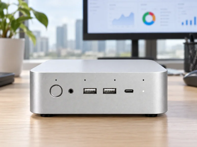 Illustratie: Silver square mini PC on a desk