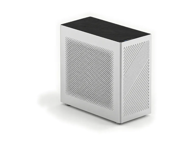 Silver perforated workstation tower on a light studio background
