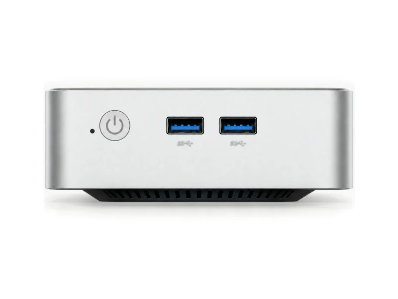 Silver compact mini PC on a light studio background