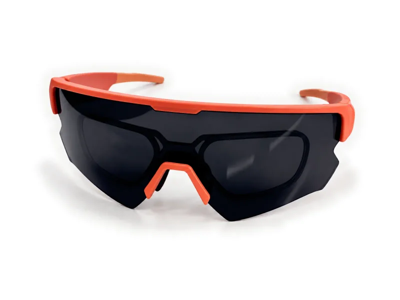 Coral orange sports audio glasses with dark wraparound lenses on a light studio background
