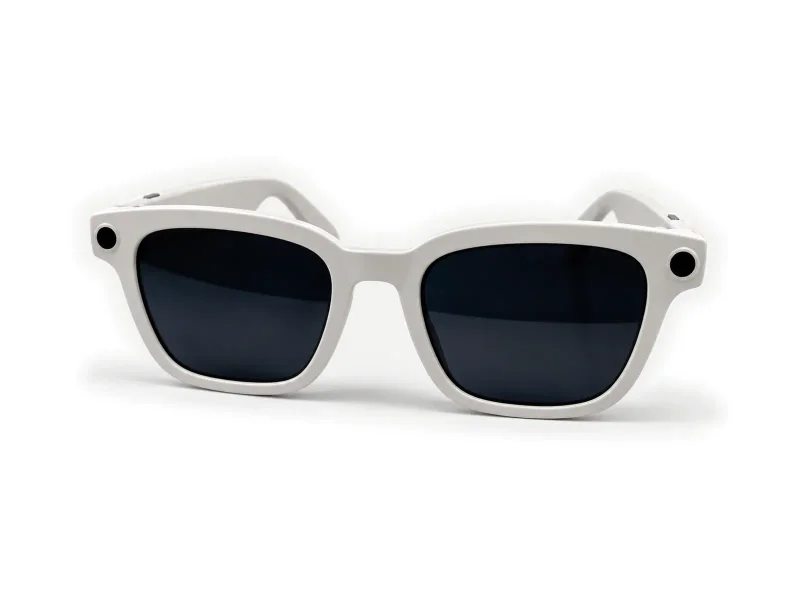 White camera sunglasses with dark lenses on a light studio background
