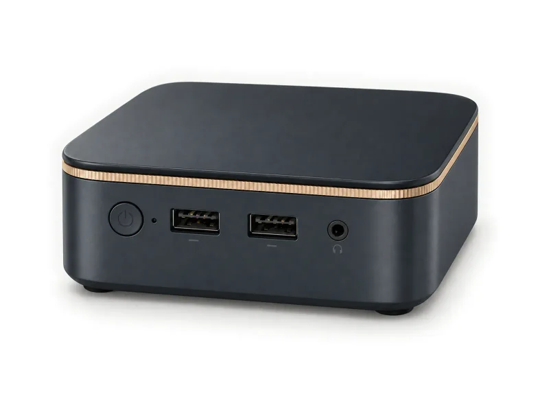 Dark mini PC with thin champagne-gold lid trim on a light studio background