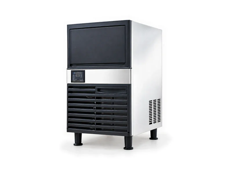 Compact stainless cube ice maker on a light studio background
