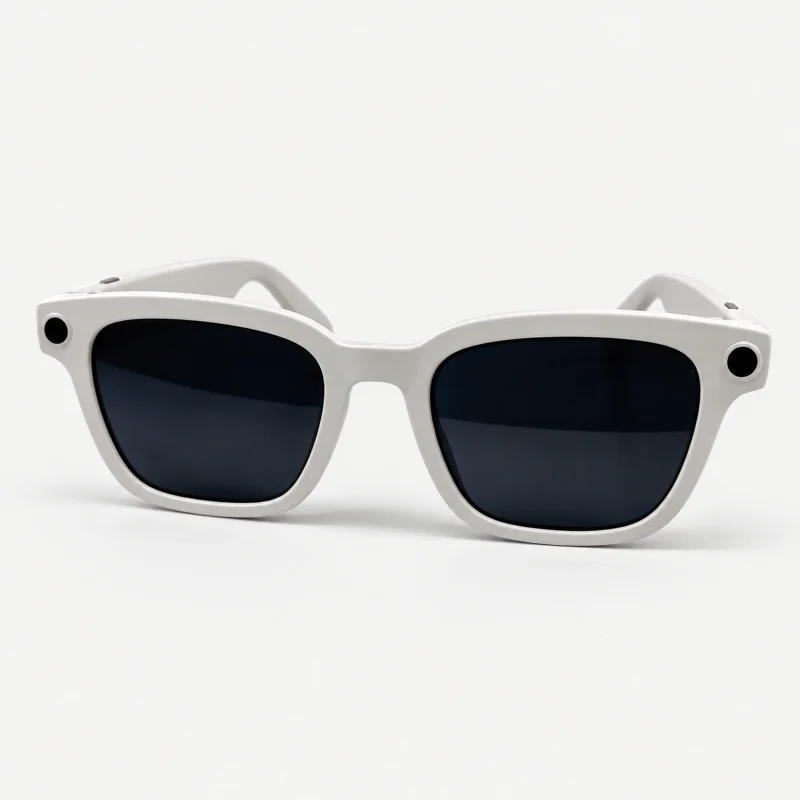 White camera sunglasses with dark lenses on a light studio background